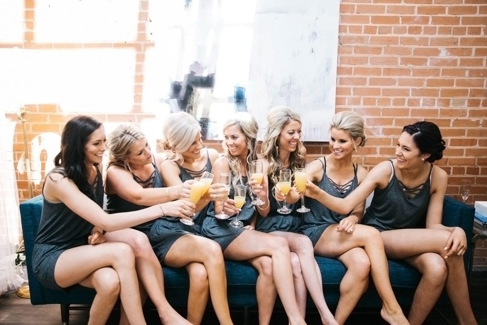 Stress free wedding morning is when bridesmaids are drinking mimosas 