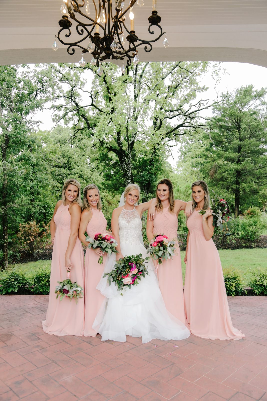 Bride and Bridesmaids portrait at the Springs Event Venue in Rockwall 